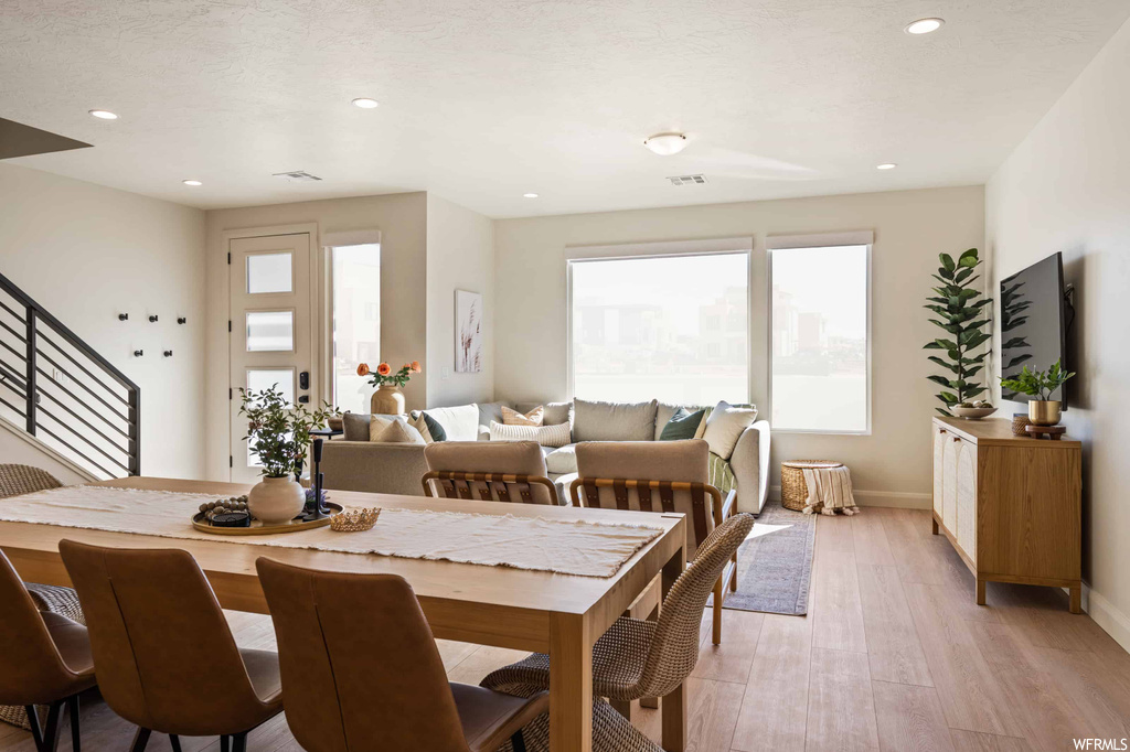 Dining area featuring light hardwood flooring