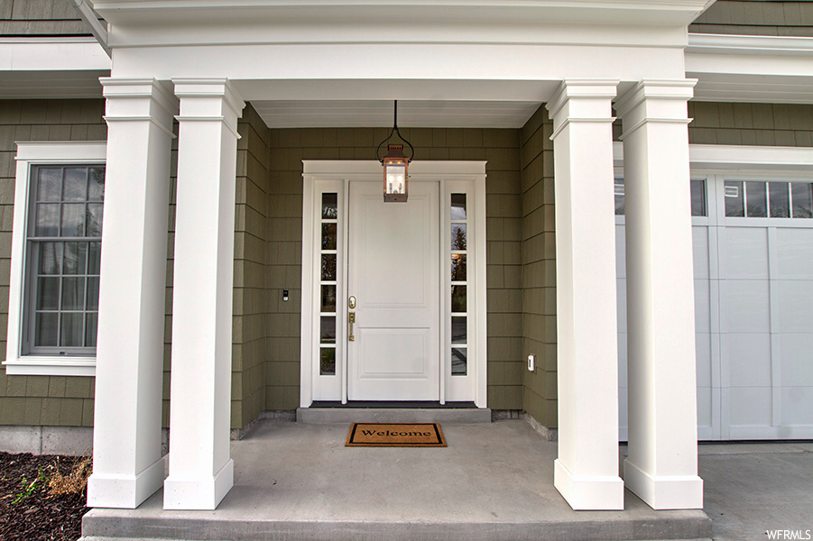 Entrance to property with a porch