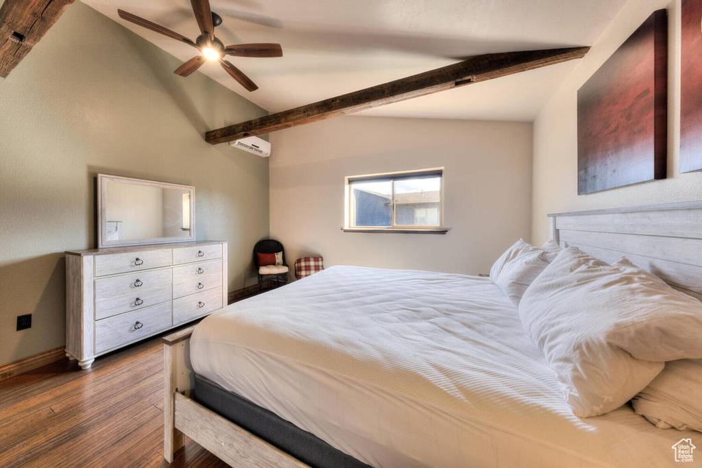 Bedroom with an AC wall unit, lofted ceiling with beams, dark hardwood / wood-style flooring, and ceiling fan