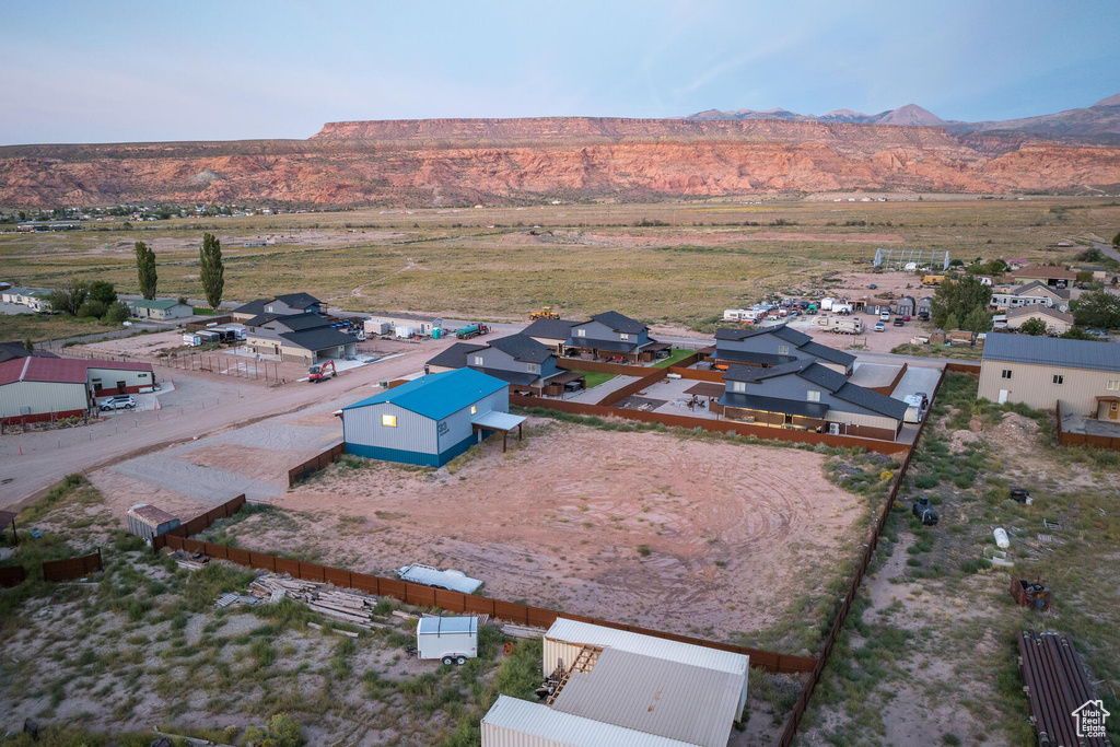 Birds eye view of property featuring a mountain view