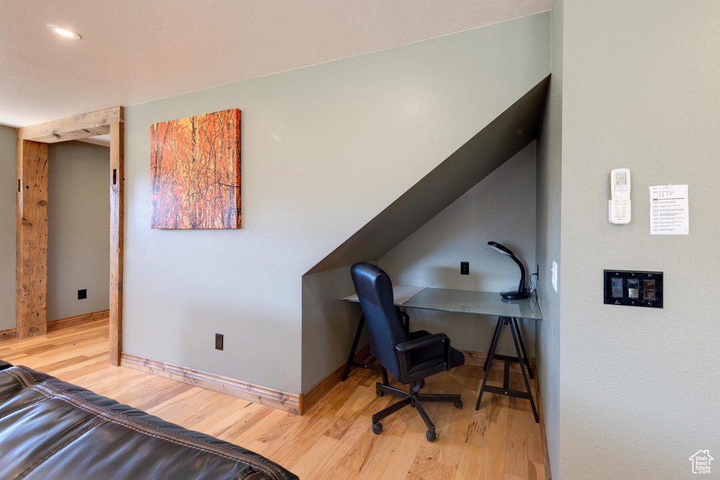 Office area featuring hardwood / wood-style flooring