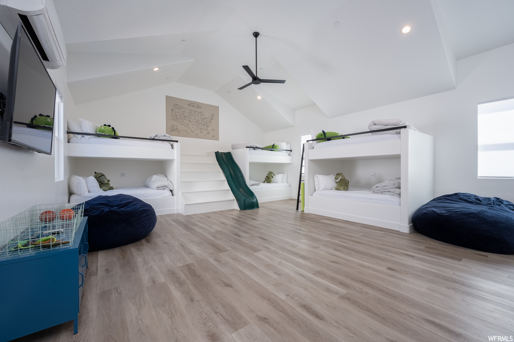 Interior space featuring lofted ceiling and light hardwood flooring