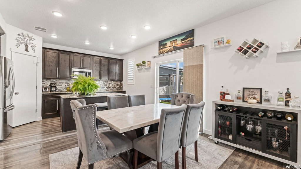 Dining area featuring light hardwood floors