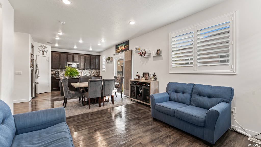 View of hardwood floored living room
