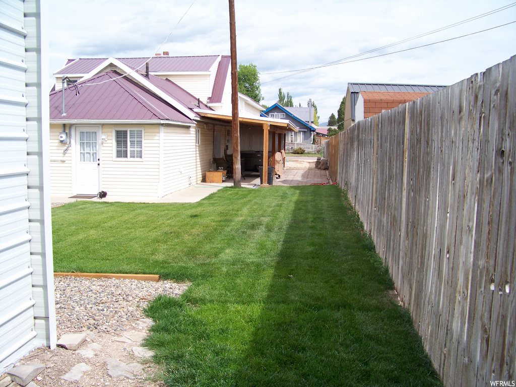 View of yard featuring a patio