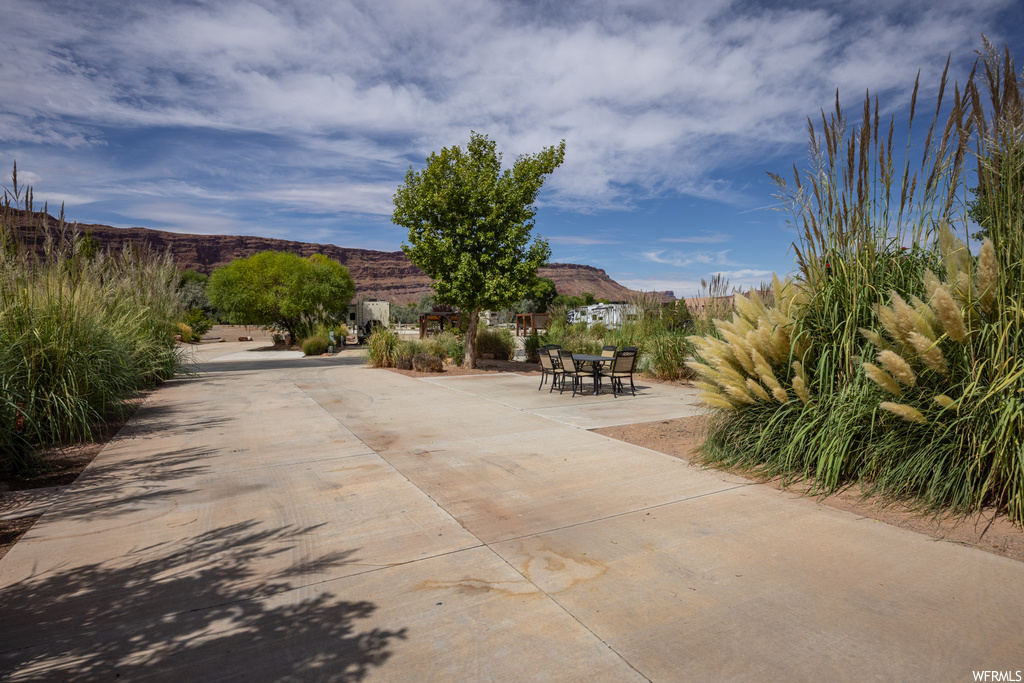 View of nearby features featuring a patio area and a mountain view