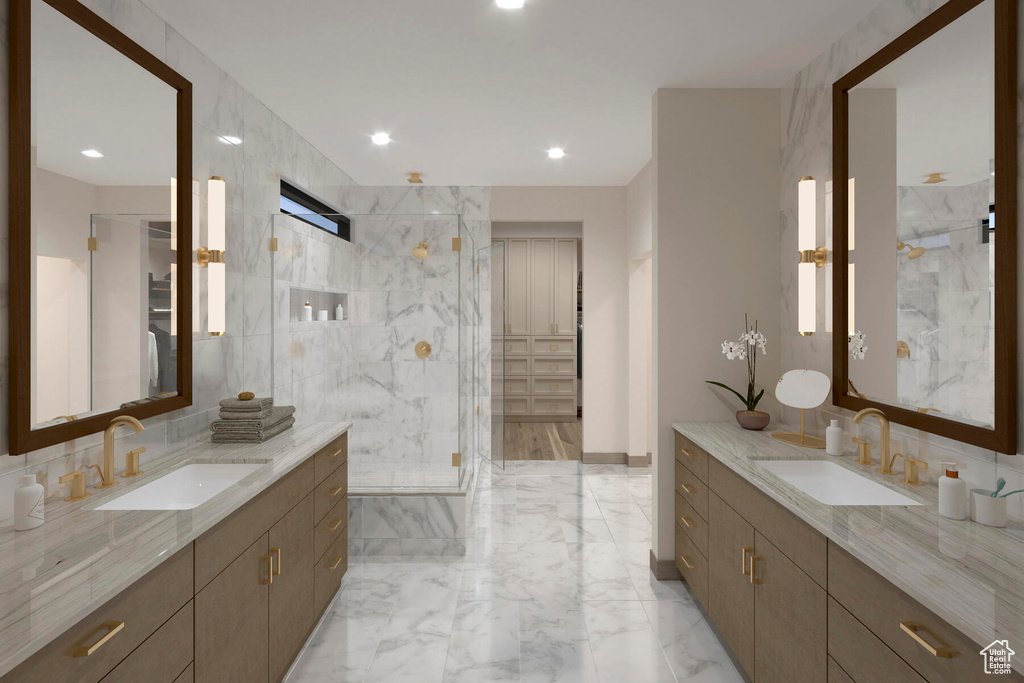 Bathroom featuring vanity, an enclosed shower, and decorative backsplash