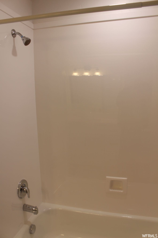 Bathroom featuring tub / shower combination