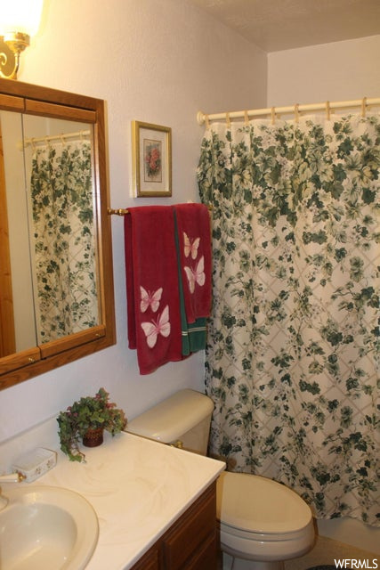 Bathroom with large vanity and mirror