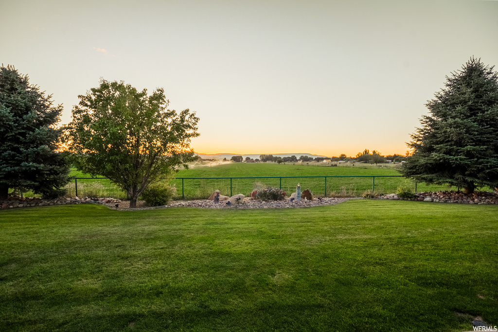View of yard at dusk