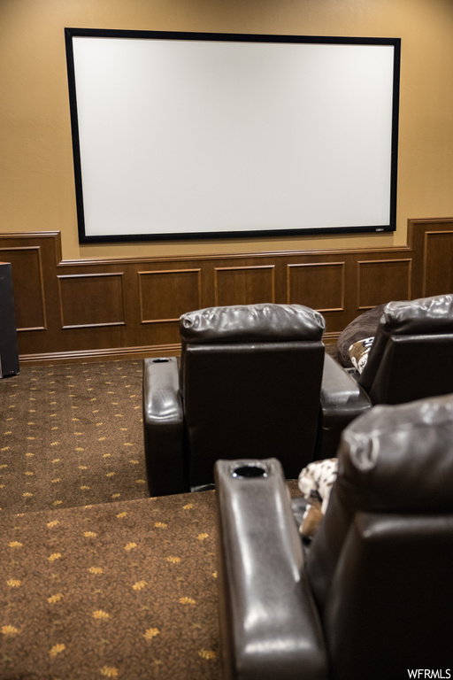 Cinema room with dark carpet