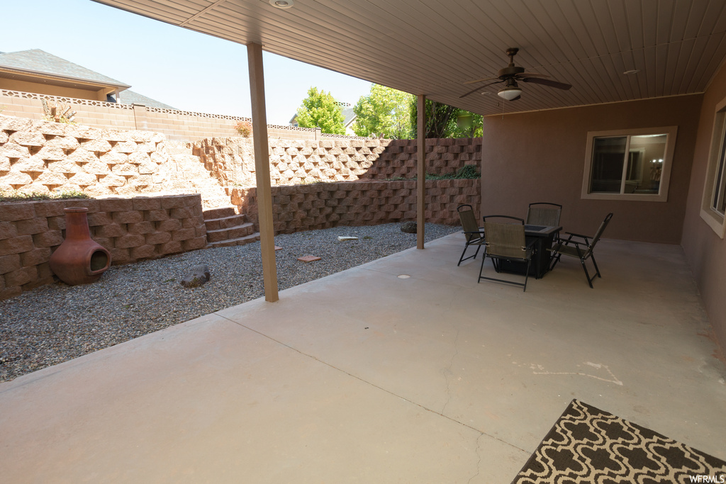 View of patio with ceiling fan