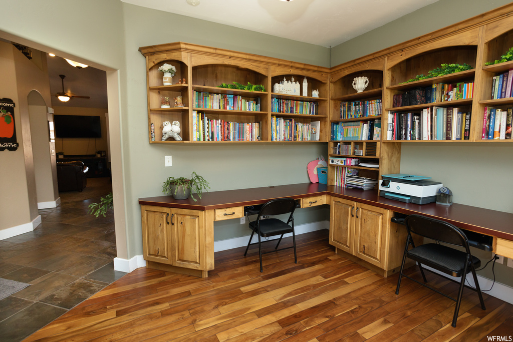 View of hardwood floored home office