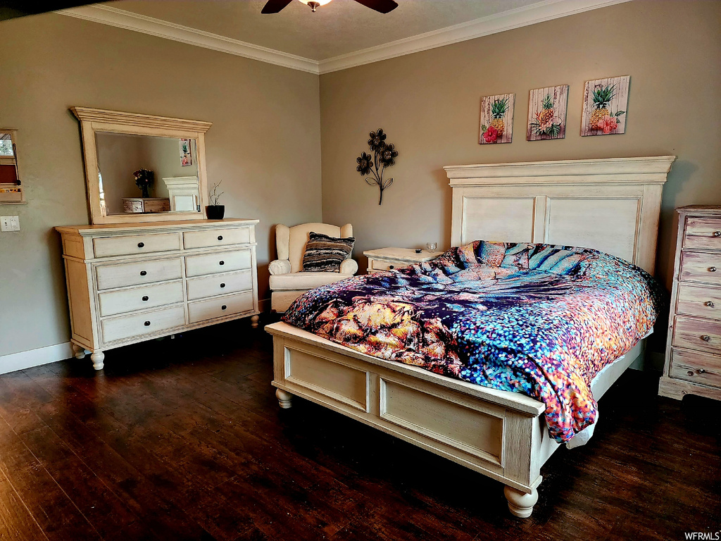 Bedroom featuring crown molding, ceiling fan, and dark hardwood floors