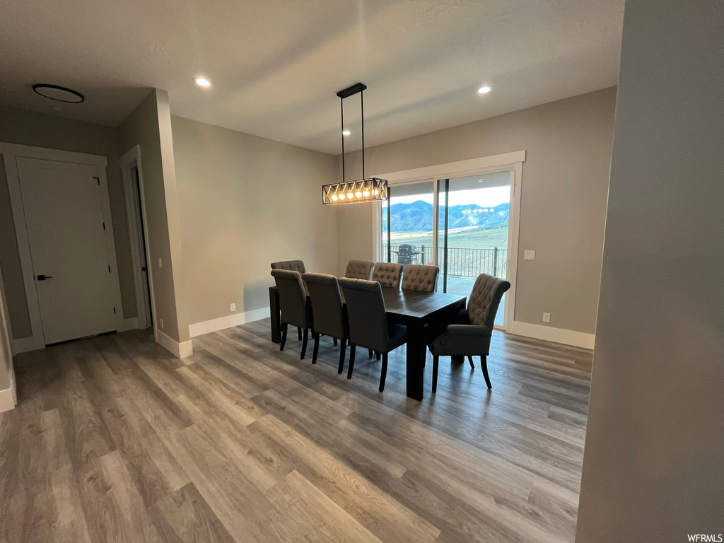 Dining space featuring light hardwood flooring