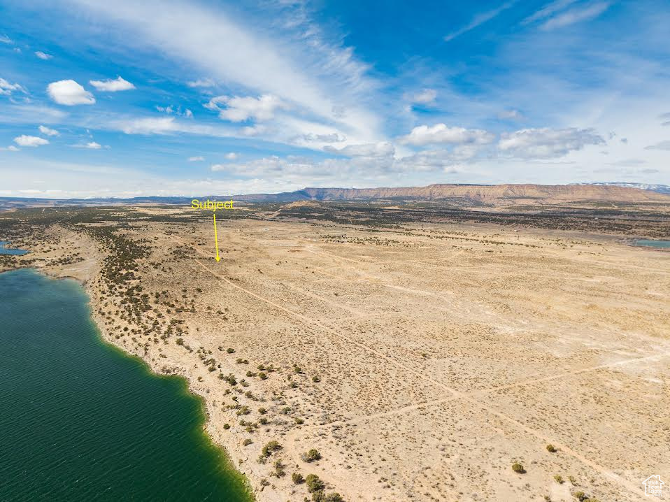 Aerial view with a water and mountain view