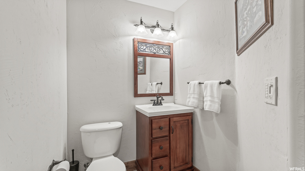 Bathroom with oversized vanity and mirror