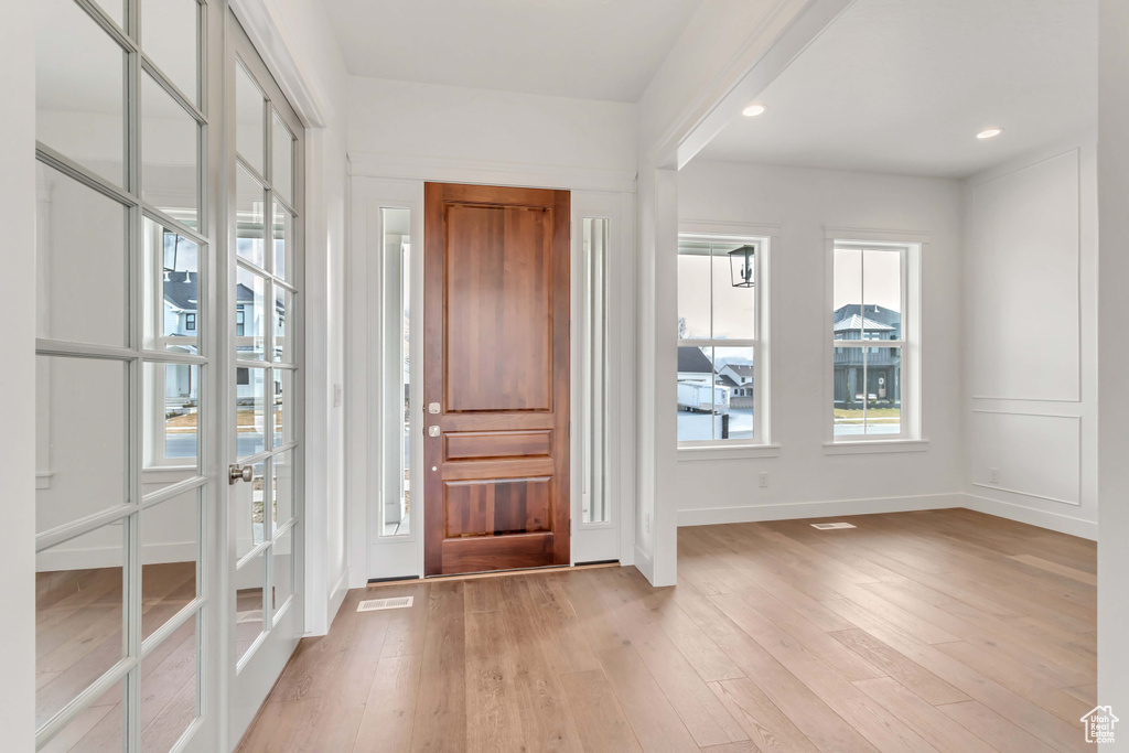 Foyer featuring light hardwood / wood-style floors