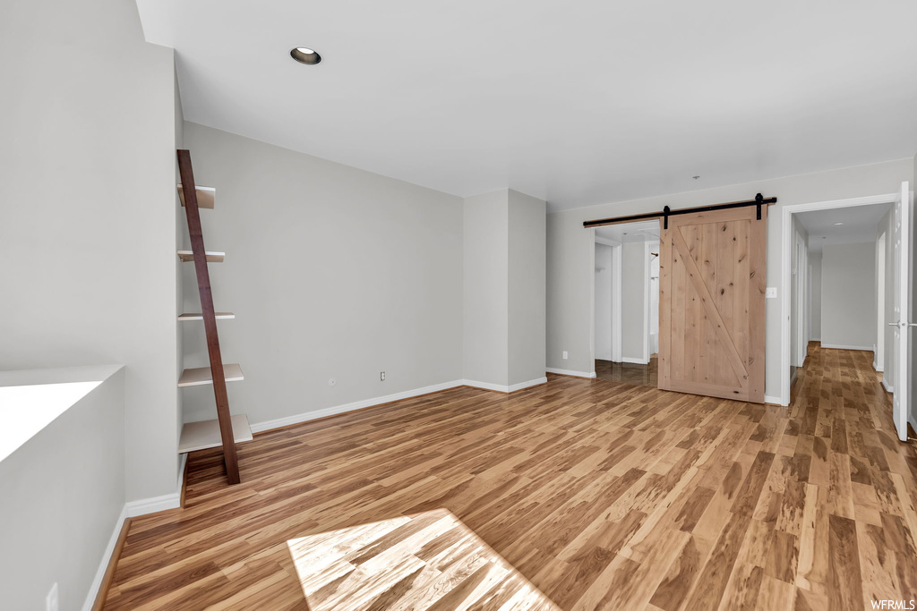 Spare room featuring light hardwood flooring