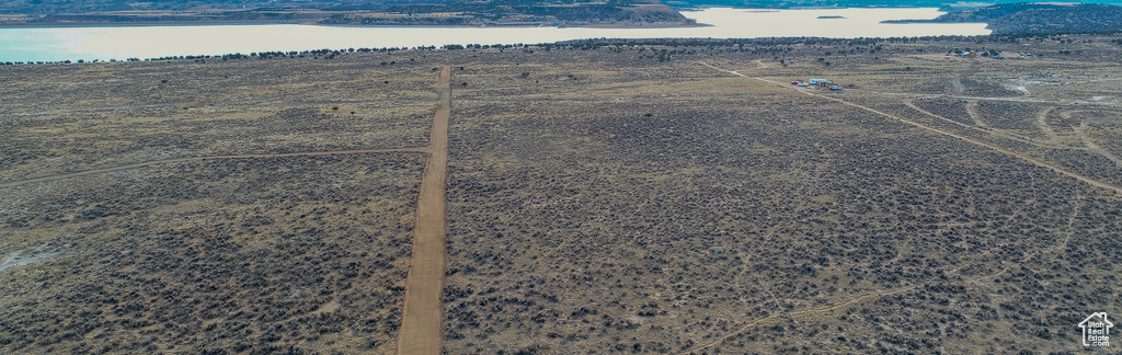 Birds eye view of property featuring a rural view