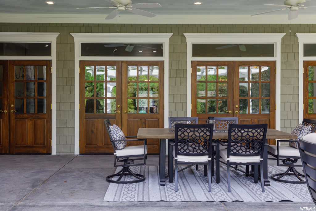 View of patio / terrace with french doors and ceiling fan