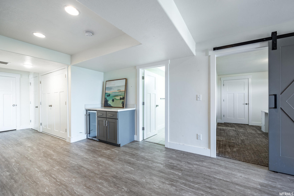 Interior space with light countertops and light hardwood floors