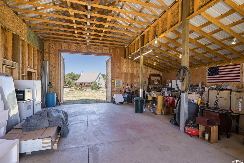 Garage with washer and clothes dryer