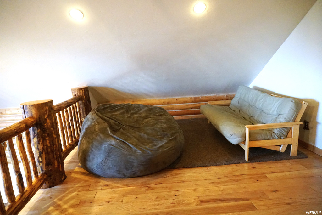 Living area with light hardwood flooring