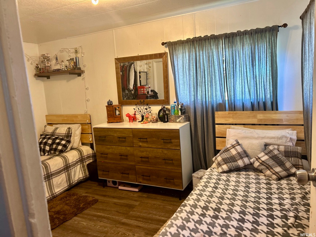 Bedroom featuring hardwood flooring