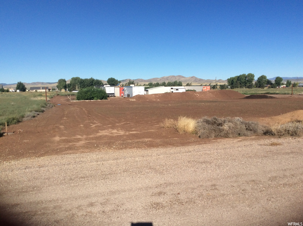 View of yard with a mountain view