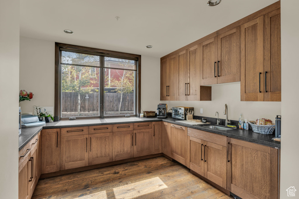 Kitchen featuring sink and hardwood / wood-style floors