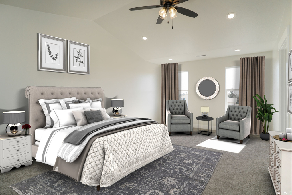 Carpeted bedroom featuring lofted ceiling and ceiling fan