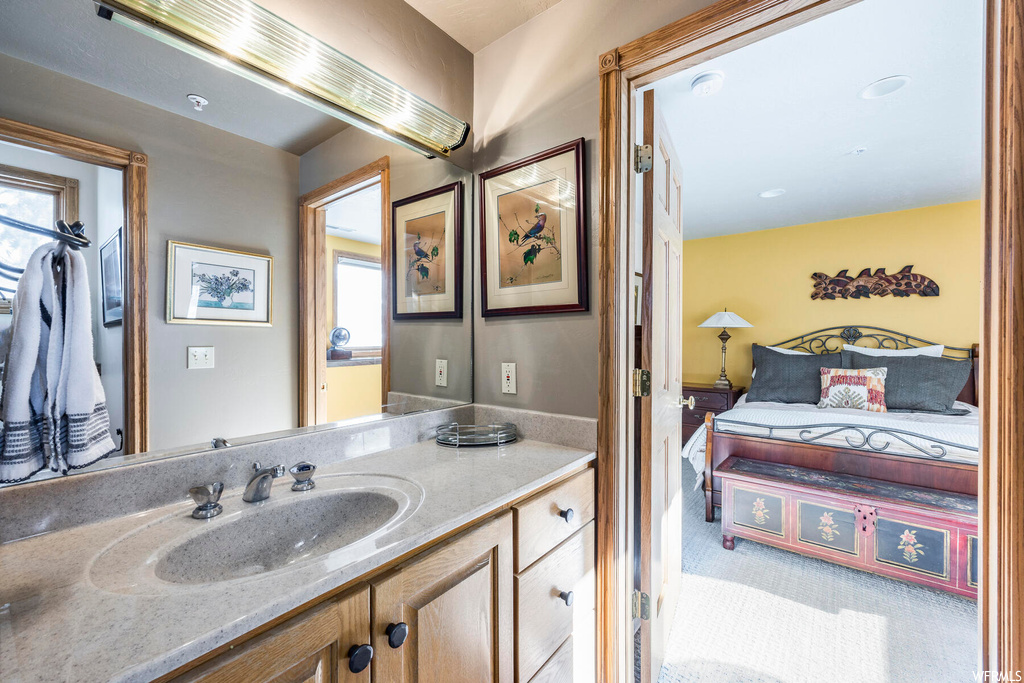 Bathroom with oversized vanity and mirror