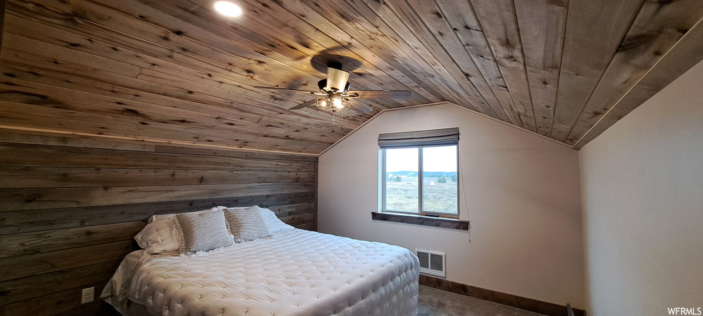 Bedroom with wood ceiling, lofted ceiling, and ceiling fan