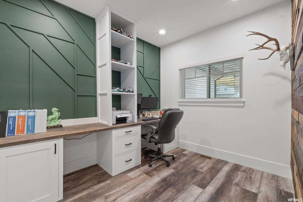 Office featuring hardwood floors