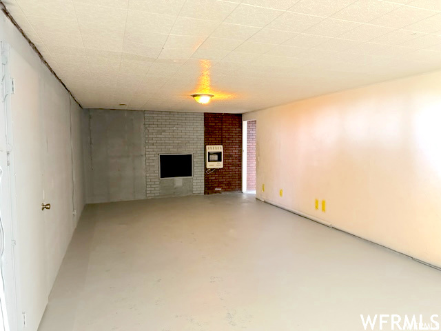 Living room with brick wall