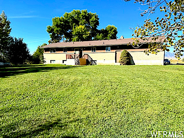 View of front of home with a front lawn