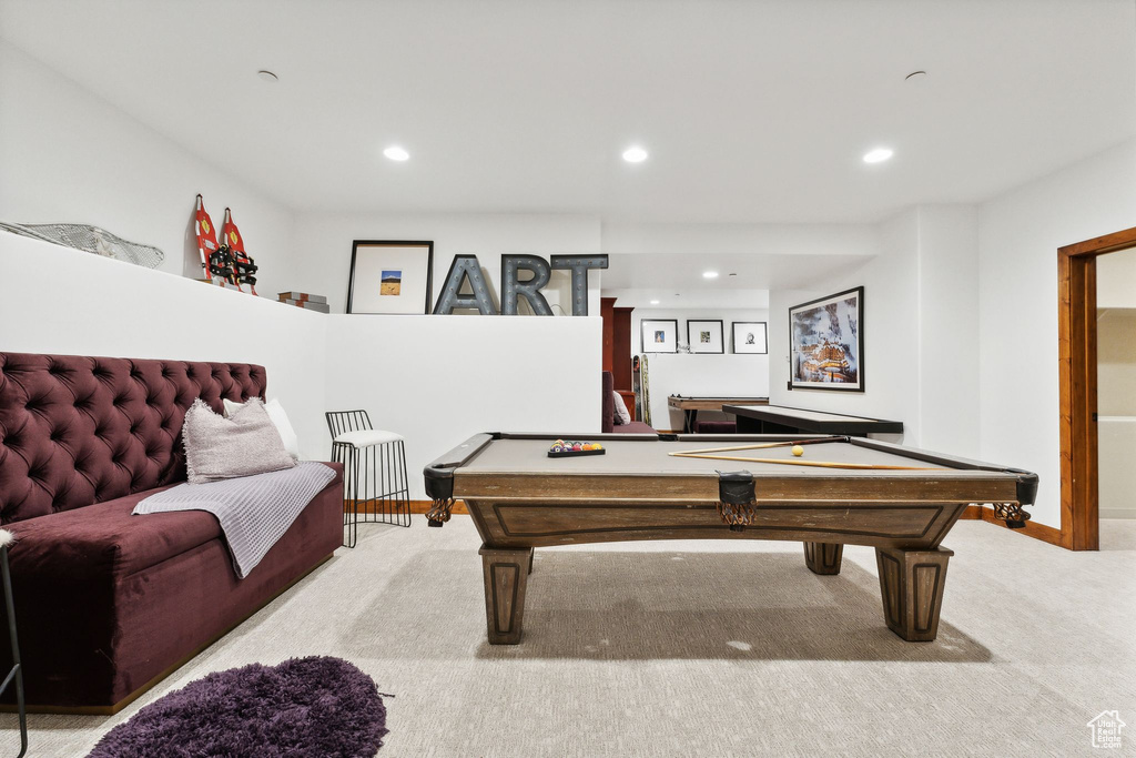 Playroom with light colored carpet and billiards