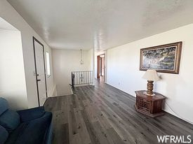 Hallway with hardwood floors