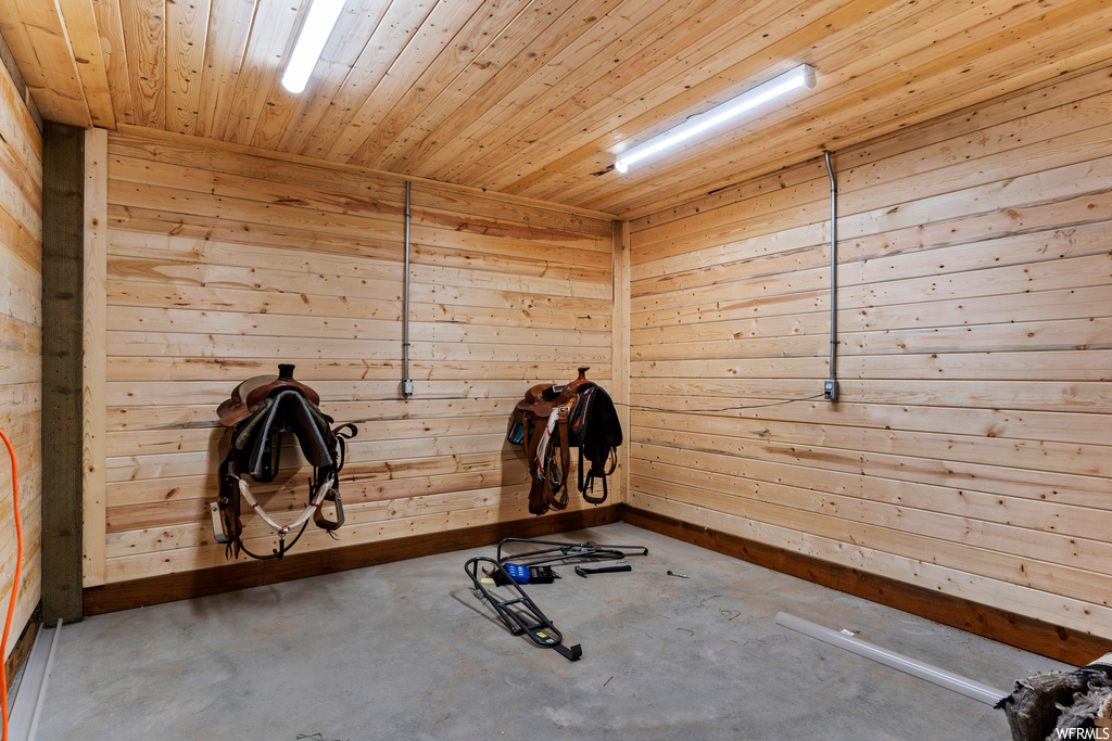 Workout room with wooden walls and wood ceiling