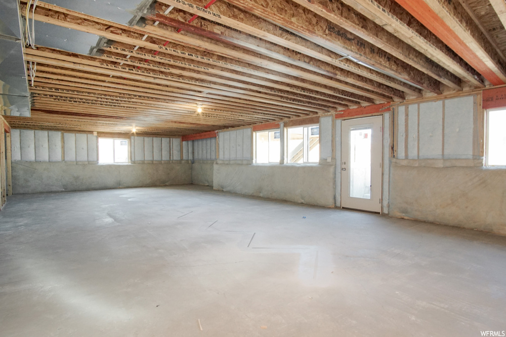 Basement featuring plenty of natural light