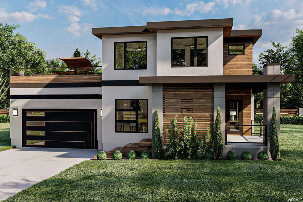 Contemporary house with garage and a front yard