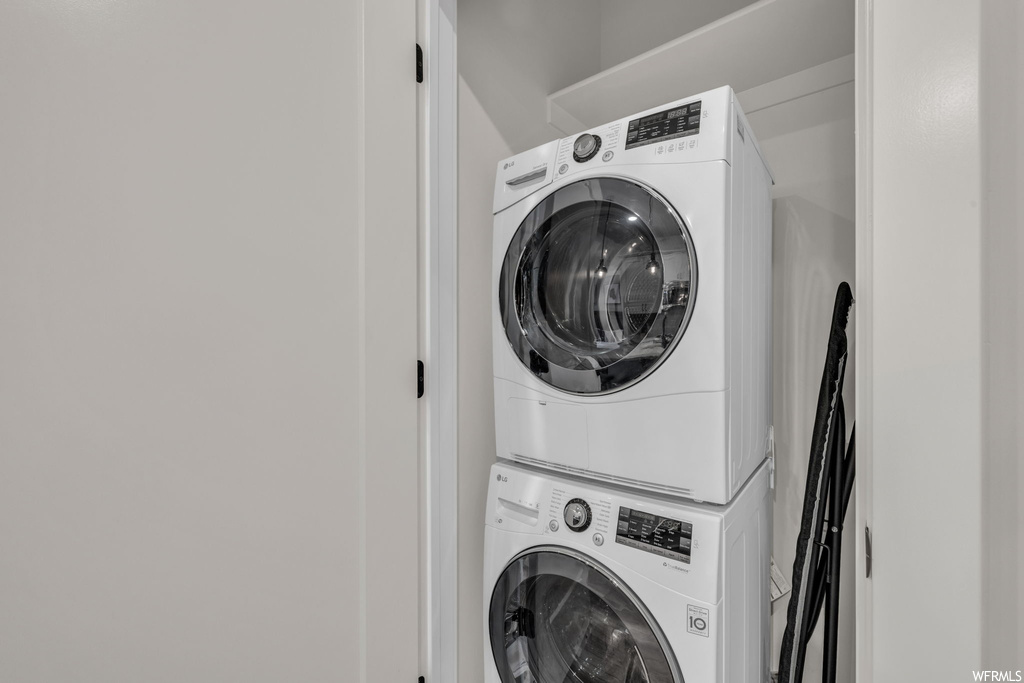 Laundry area with stacked washer / dryer