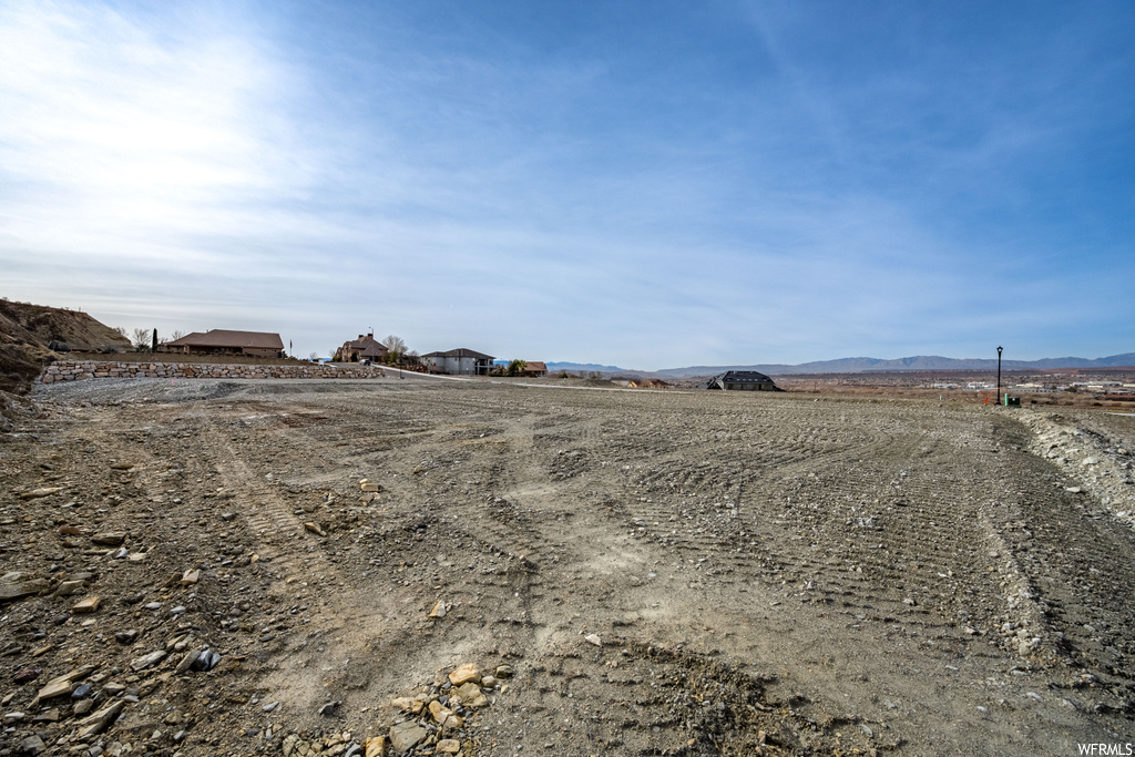 View of yard featuring a mountain view and a rural view