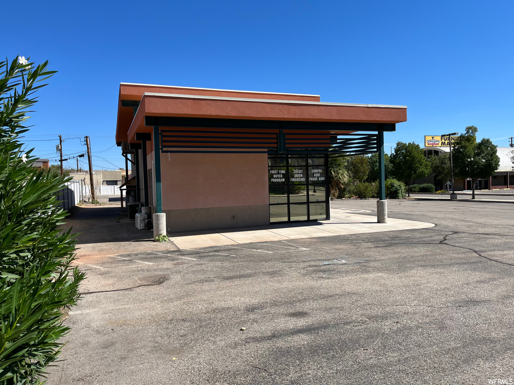 Garage featuring a carport