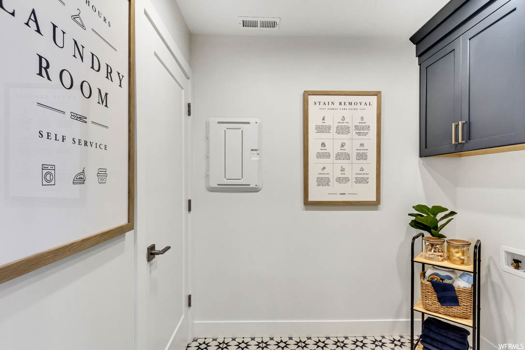 Entryway featuring light tile floors