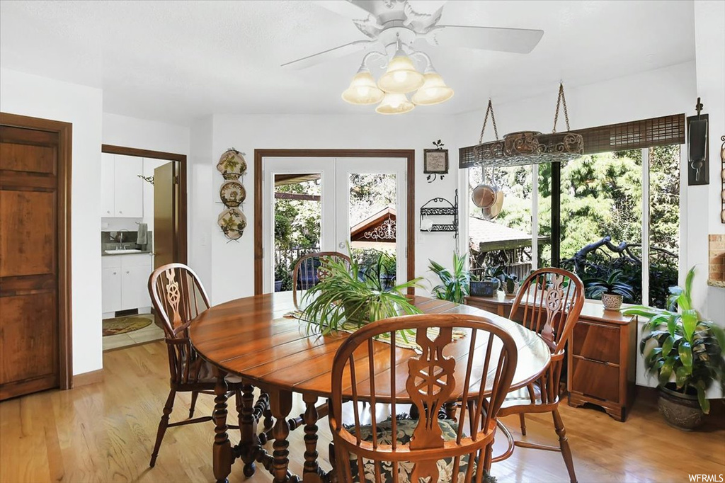 Dining room featuring light hardwood flooring and ceiling fan