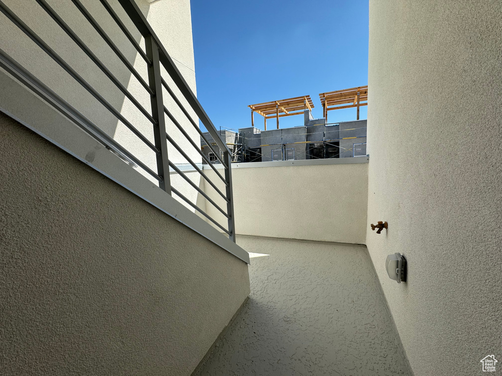View of patio / terrace with a balcony
