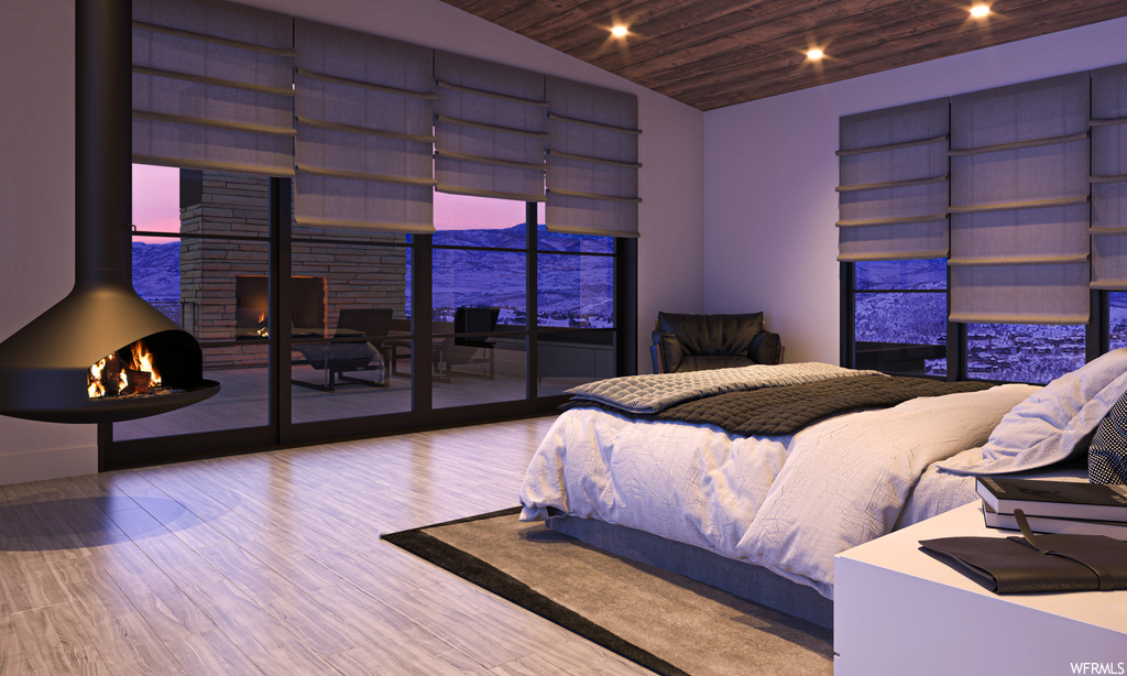 Bedroom with french doors, light hardwood floors, lofted ceiling, and wooden ceiling