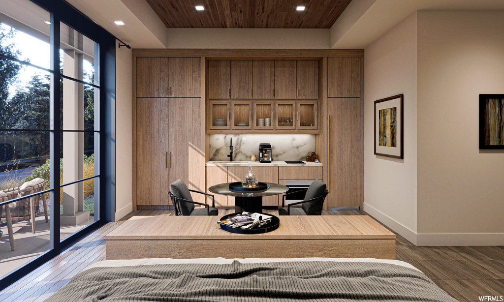 Interior space featuring wood ceiling and light hardwood floors
